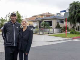 Walter and Sophie Clements near the house his father Deacon Walter Clements built in the 1950s. Deacon Clements’ son reflects on his father’s legacy. Photo by Arturo Garcia-Ayala